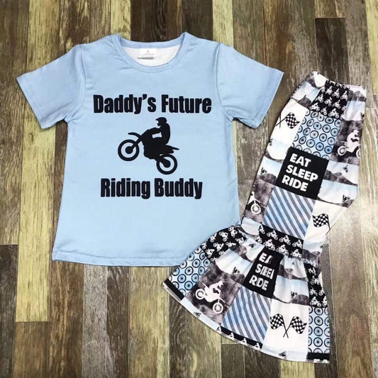Daddy’s future riding buddy